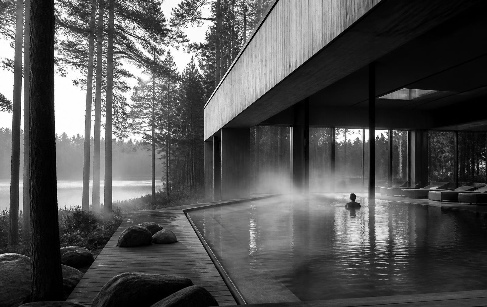 Black-and-white photograph of Dr Irena Eris Wzgorza Dylewskie Spa in Poland, a forest-and-lake thermal wellness resort