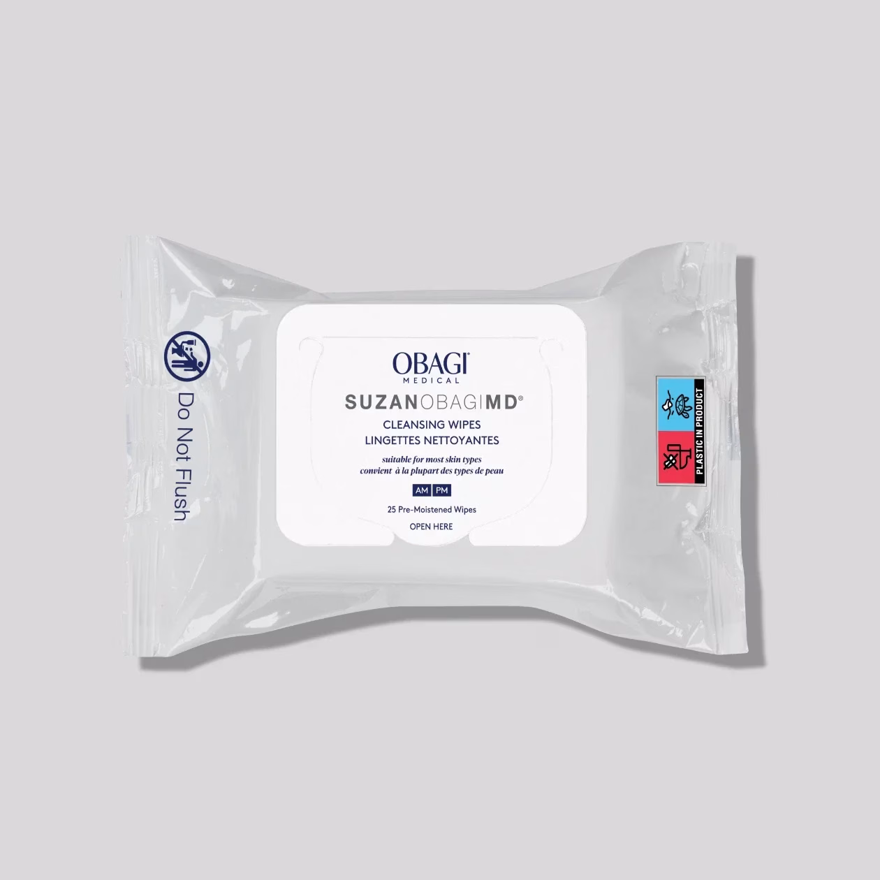 A package of SuzanObagi Cleansing Wipes with a white label is shown on a light gray surface, featuring product details and a Do Not Flush symbol on the side.