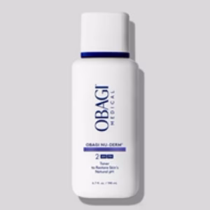 A white bottle of Obagi travel size toner with a blue cap and blue text stands upright on a light gray background, labeled as Step 2 in the skincare system.
