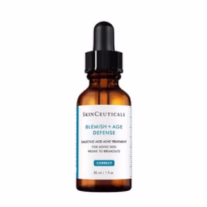 A 30 ml brown glass dropper bottle labeled Skinceuticals Blemish + AGE Defense, a salicylic acid treatment for aging, breakout-prone skin, with a black dropper cap.