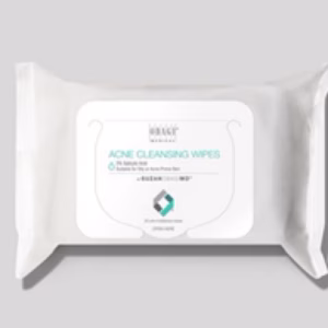 A white package of Obagi acne wipes lies on a light gray background. The label on the front displays the product name and brand in green and gray text.
