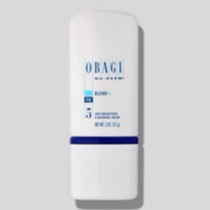 A white bottle of Obagi blend, a skin brightening and blending cream with blue accents and text, stands upright against a light gray background.