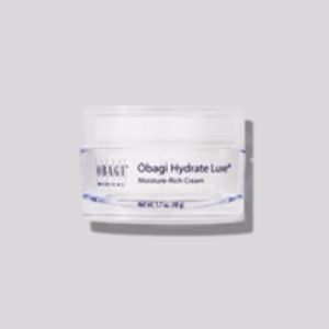 A jar of Obagi Hydrate Luxe with a white lid and clear container sits against a plain light gray background.