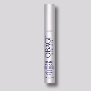 A silver tube labeled Obagi Nu cil eyelash, 0.10 fl oz/3 mL, stands upright against a plain light gray background.