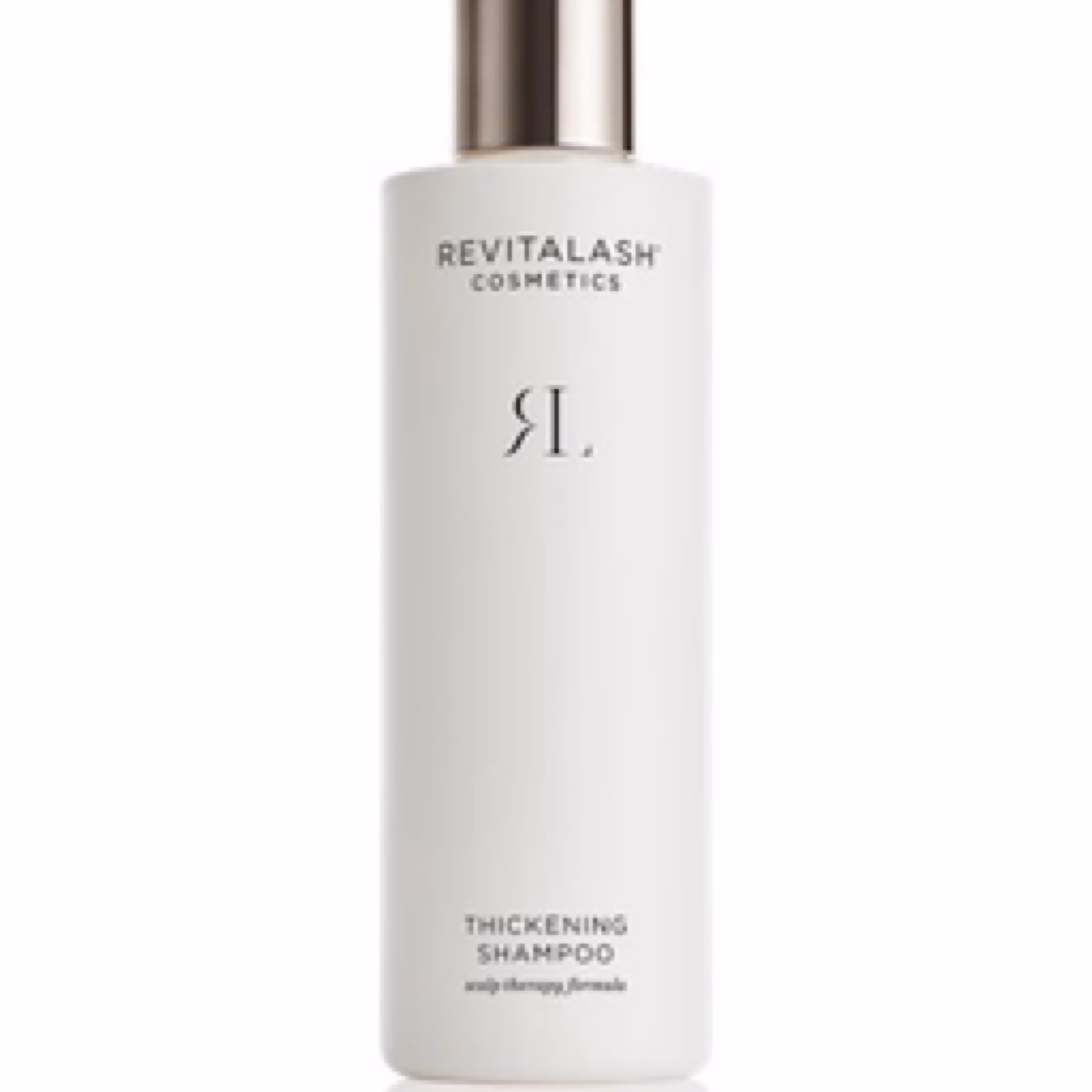 A white bottle of Revitalash shampoo with a silver cap, displaying minimalist black text and logo on the front.